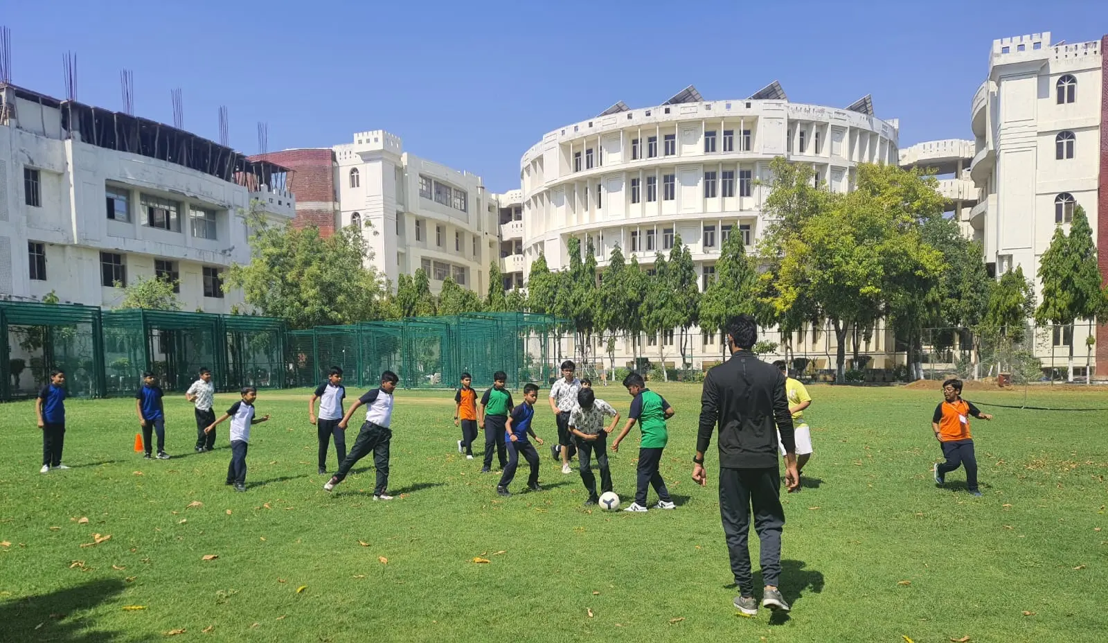 students playing football
